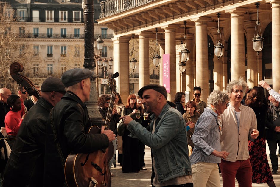 A vibrant street performance with musicians and dancers at Palais-Royal in Paris, France. fete de la musique 